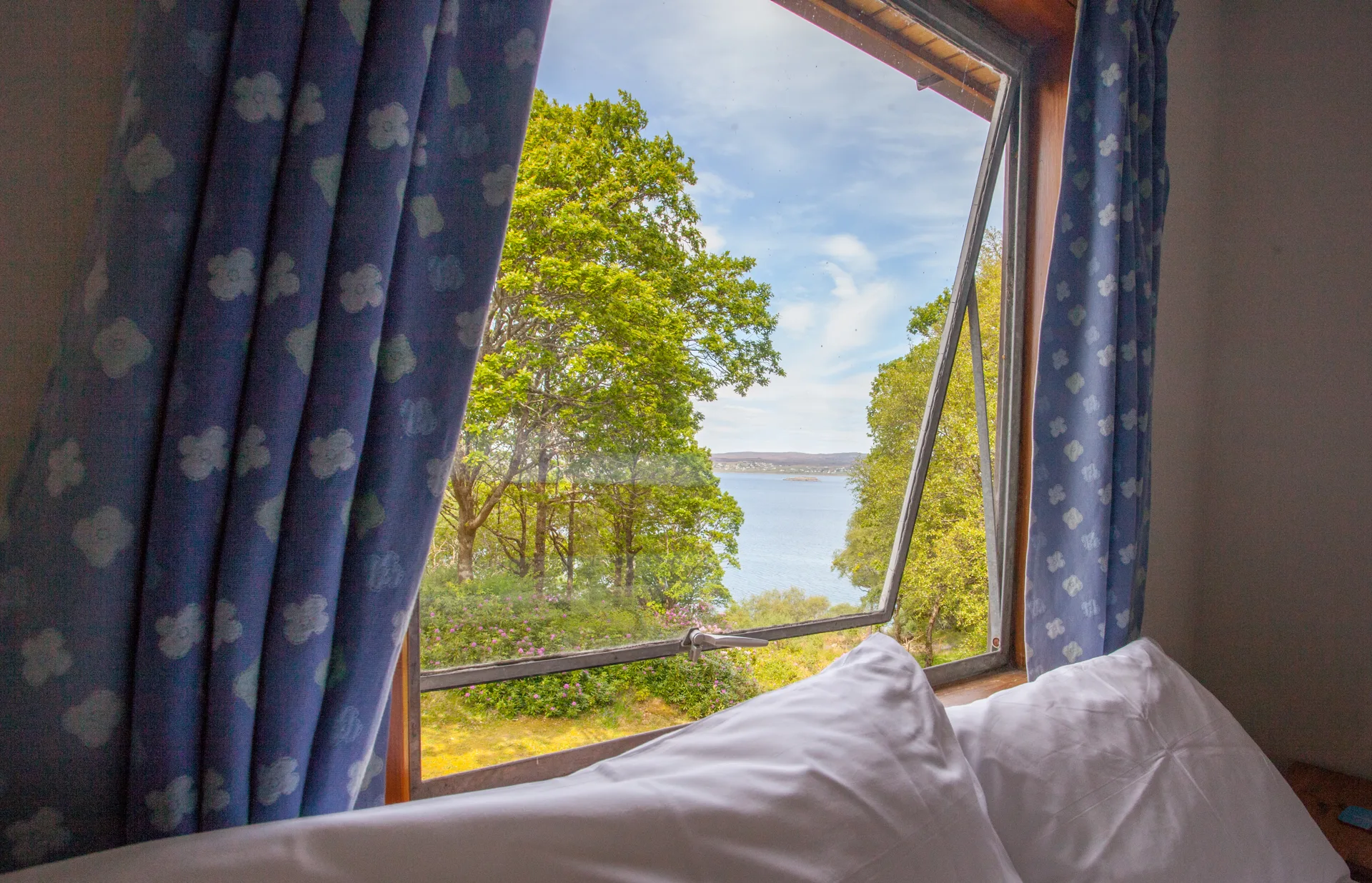 Loch Gairloch seen through an open bedroom window at Sealladh na Mara
